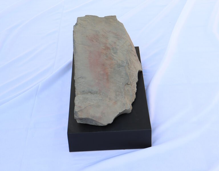 Block of limestone with paint. Photo: Michael Marques